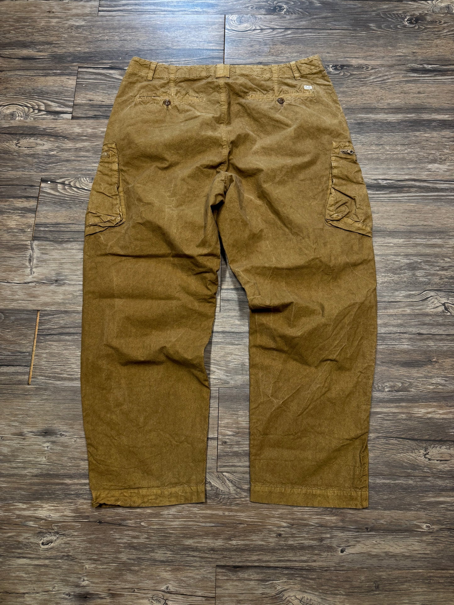 C.P. COMPANY WAXED BA-TIC LOOSE FIT PANTS (34)