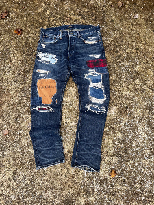 POLO RALPH LAUREN DISTRESSED & REPAIRED JEANS (32)