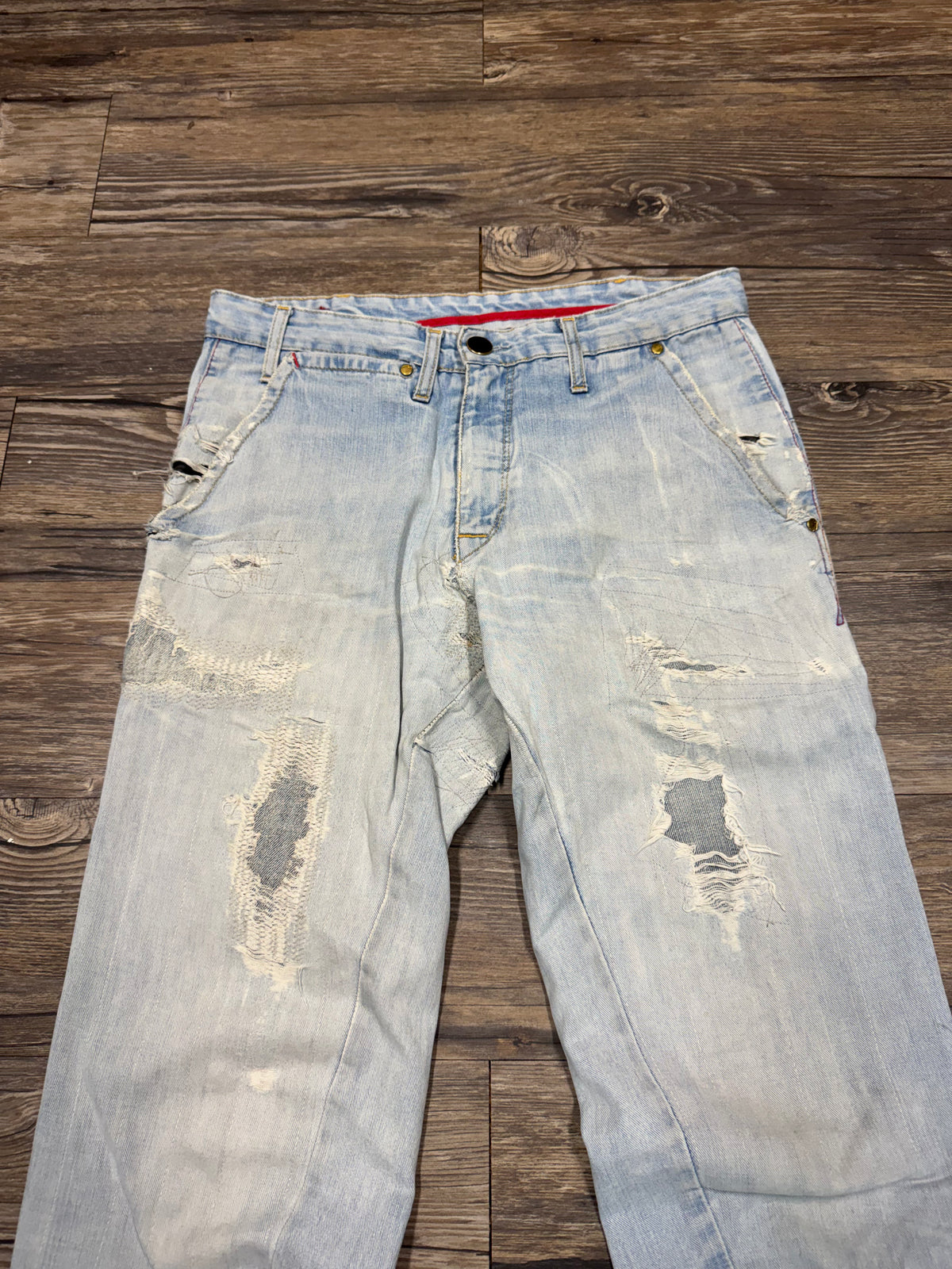 LEVIS ENGINEERED REPAIRED LIGHTWASH BOOTCUT JEANS (31)