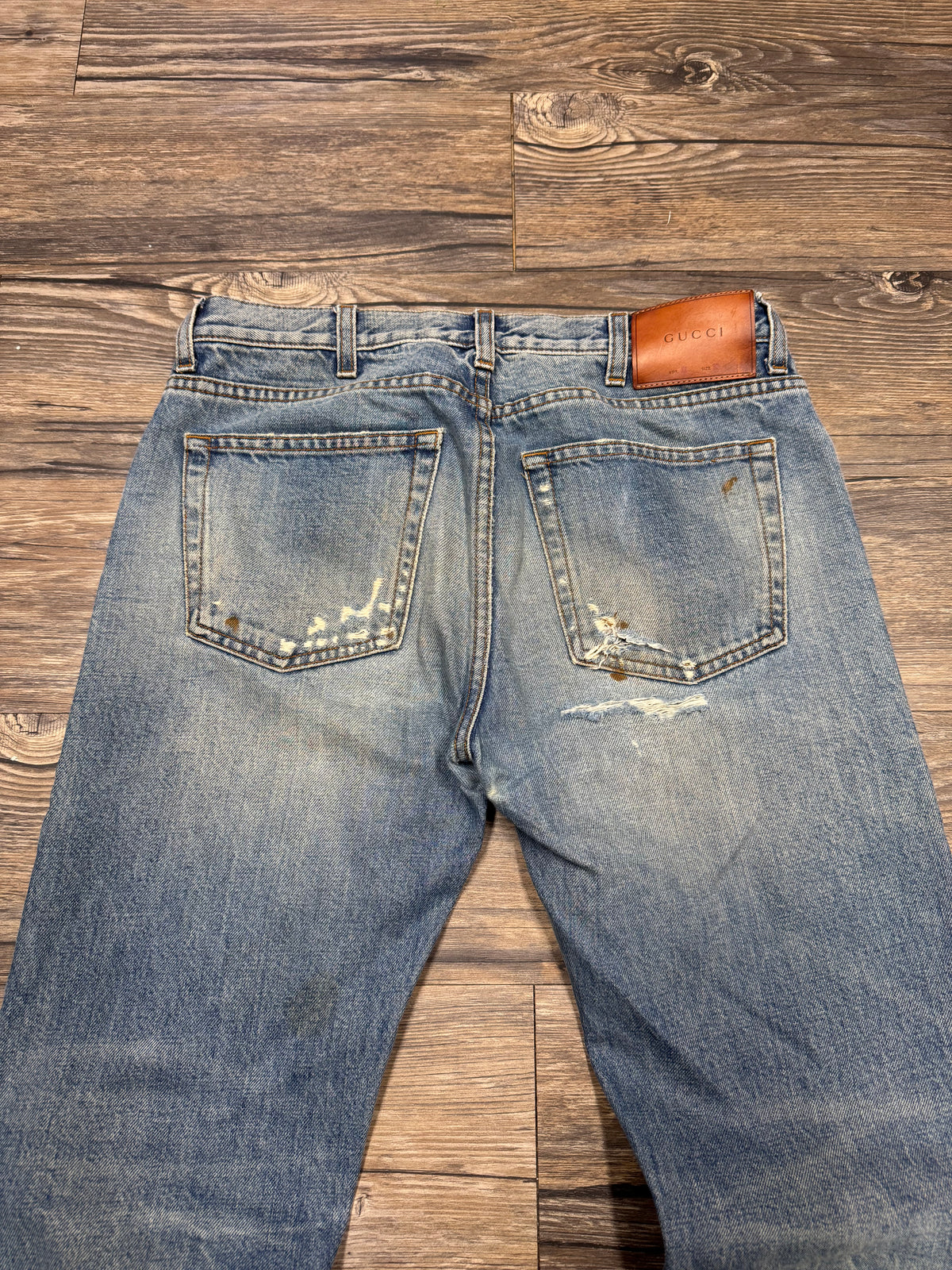 GUCCI BOOTCUT DISTRESSED FOLDED DENIM JEANS (30)