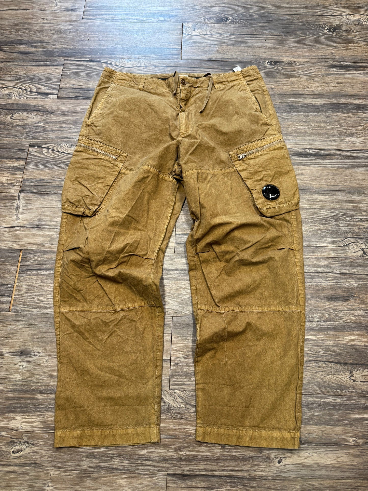 C.P. COMPANY WAXED BA-TIC LOOSE FIT PANTS (34)