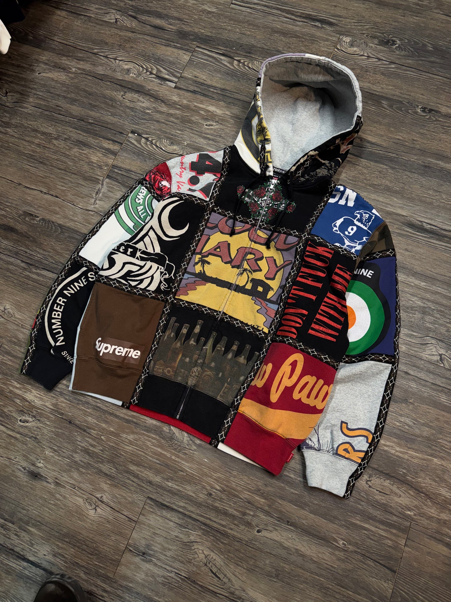 SUPREME NUMBER (N)INE PATCHWORK ZIP-UP HOODIE