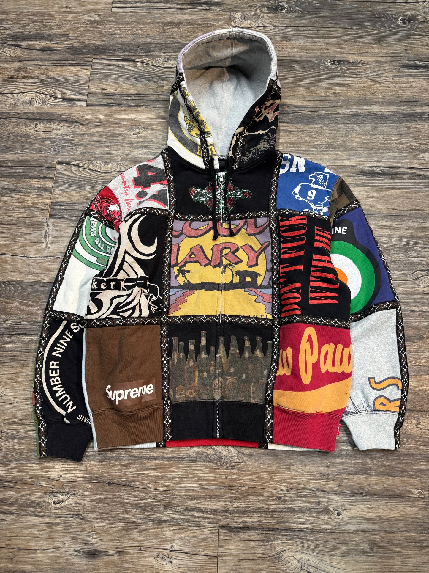 SUPREME NUMBER (N)INE PATCHWORK ZIP-UP HOODIE