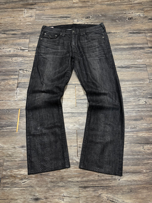 TRUE RELIGION SNAKESKIN BOOTCUT JEANS (36)
