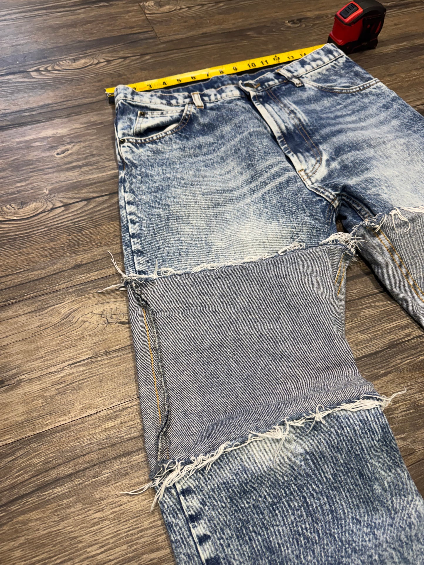 MAISON MARGIELA ACID WASH SPLICED JEANS (31)