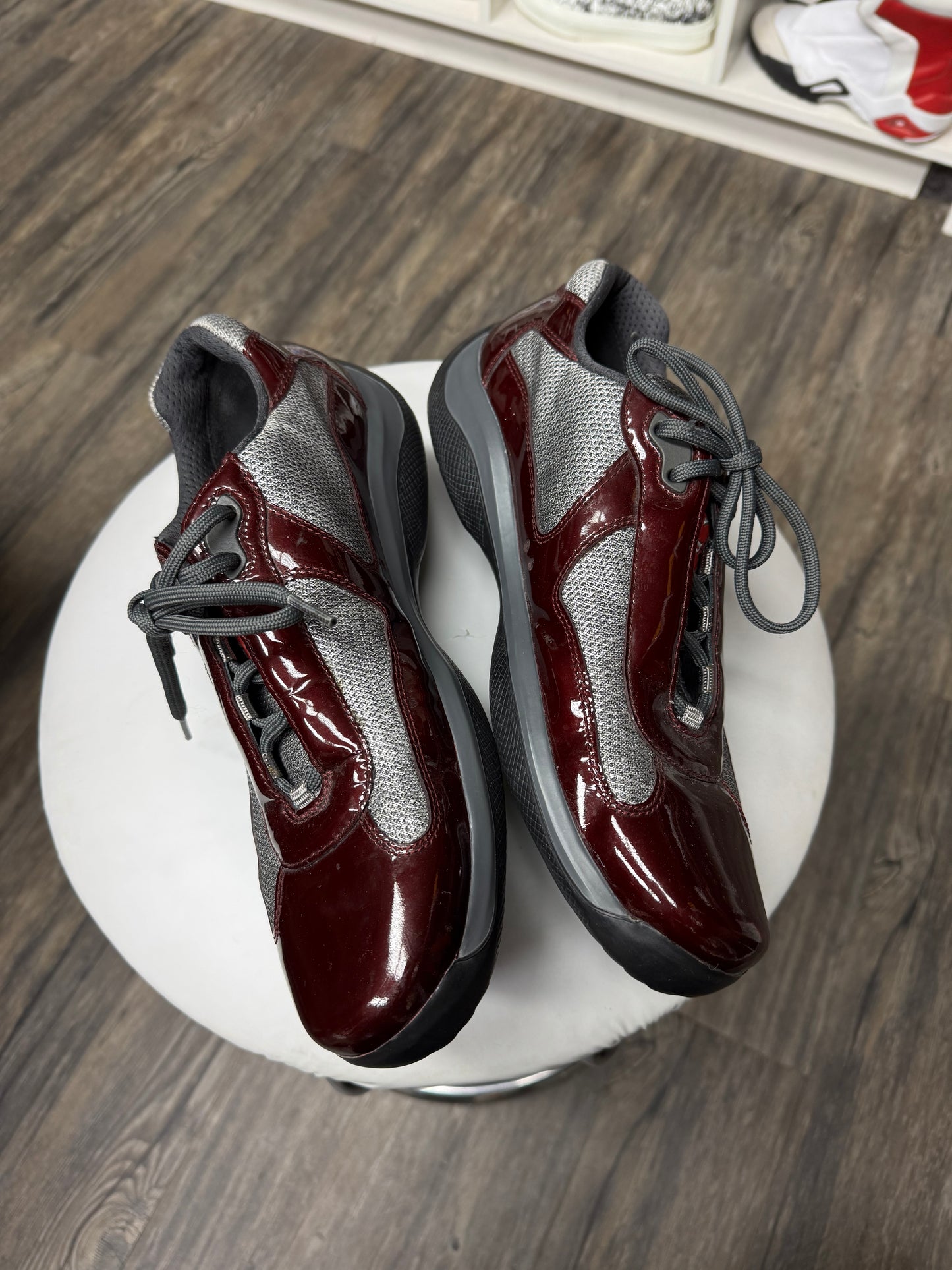 PRADA WINE RED PATENT LEATHER CUPS (10.5)