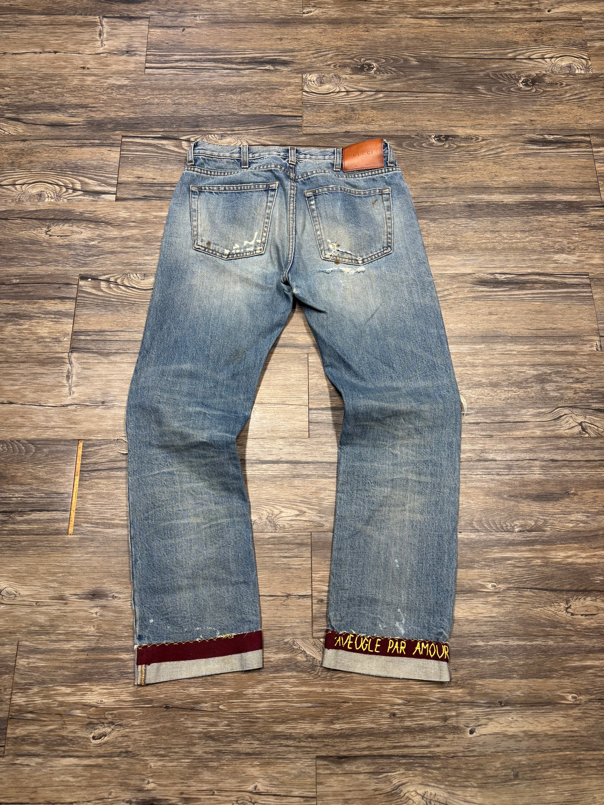 GUCCI BOOTCUT DISTRESSED FOLDED DENIM JEANS (30)