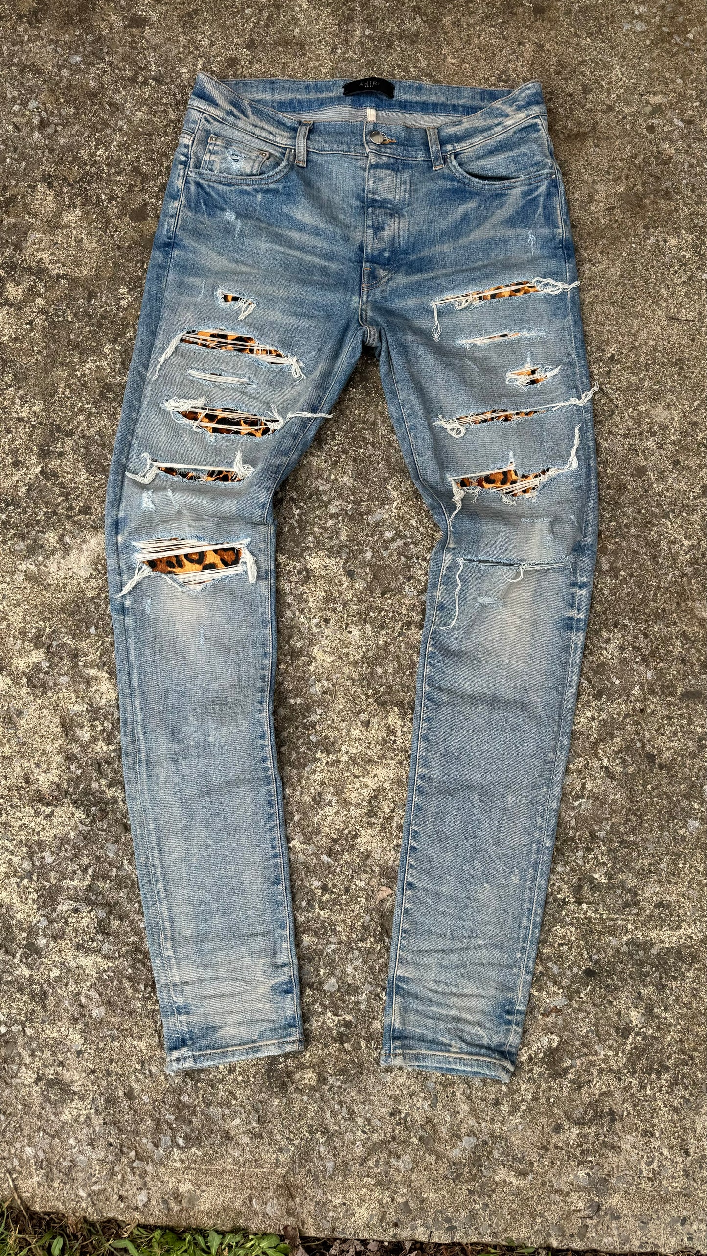 AMIRI DISTRESSED CHEETAH PRINT JEANS (33)