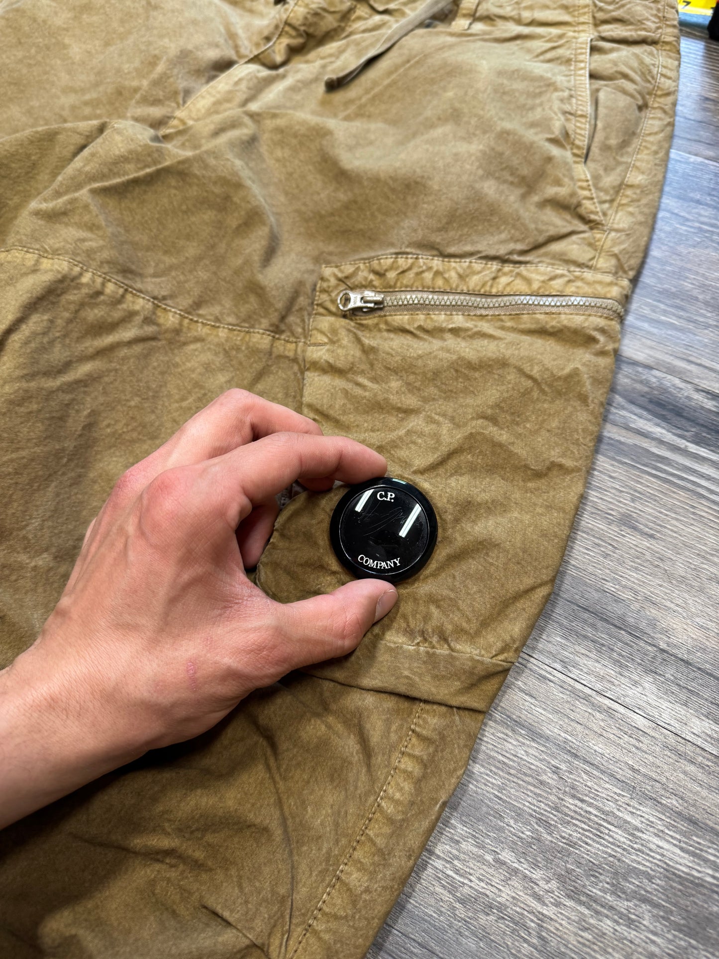 C.P. COMPANY WAXED BA-TIC LOOSE FIT PANTS (34)