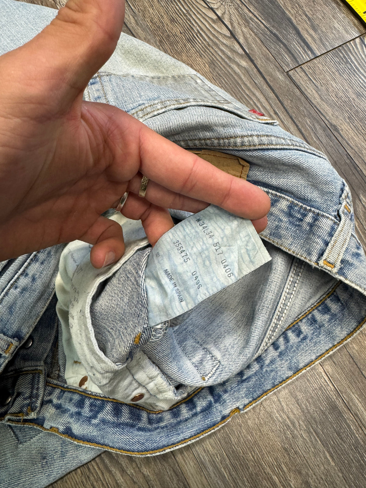 LEVI 517 DISTRESSED PATCHWORK LIGHTWASH DENIM JEANS (34)