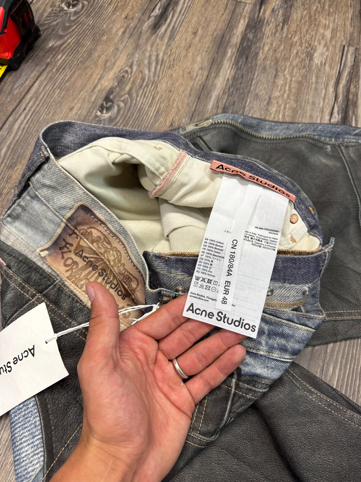 ACNE STUDIOS FAUX LEATHER CHAPS TROMPE L’OEIL JEANS (31)