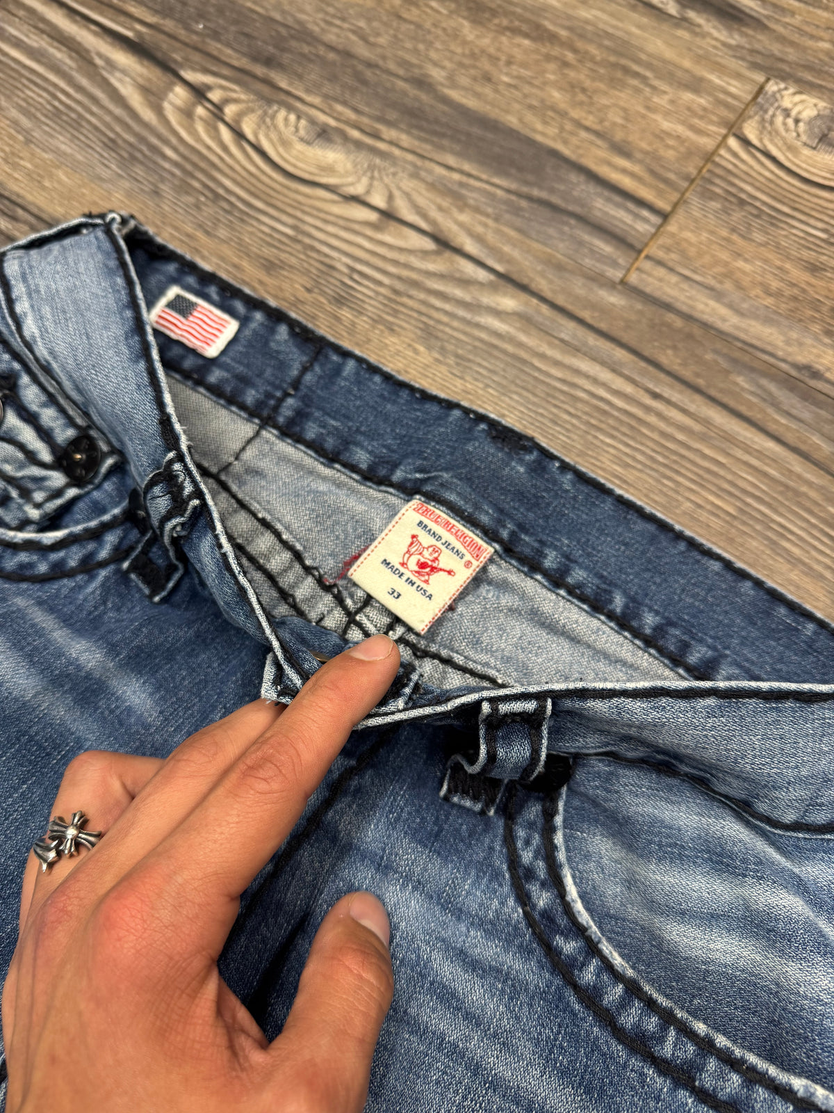 TRUE RELIGION BOOTCUT DISTRESSED JEANS (33)