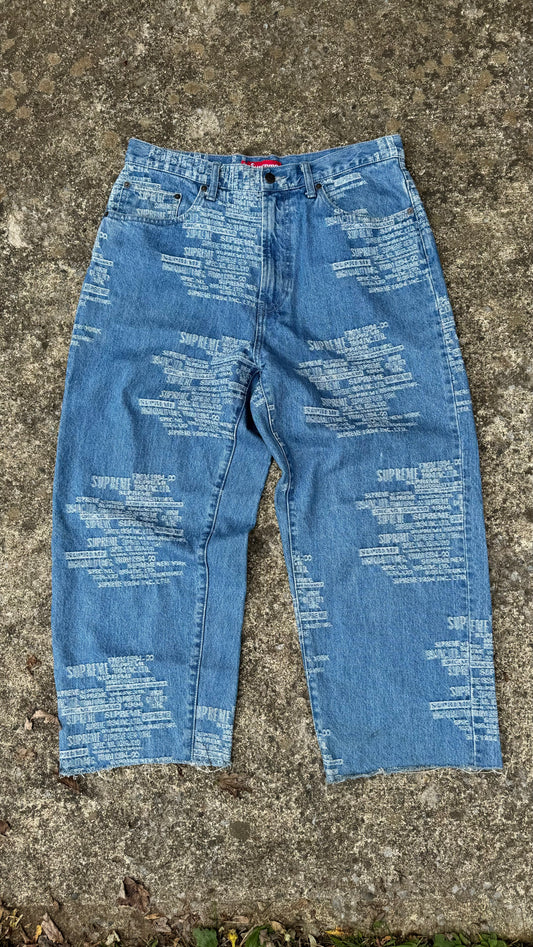 SUPREME DISTRESSED TEXT BAGGY JEANS (30)