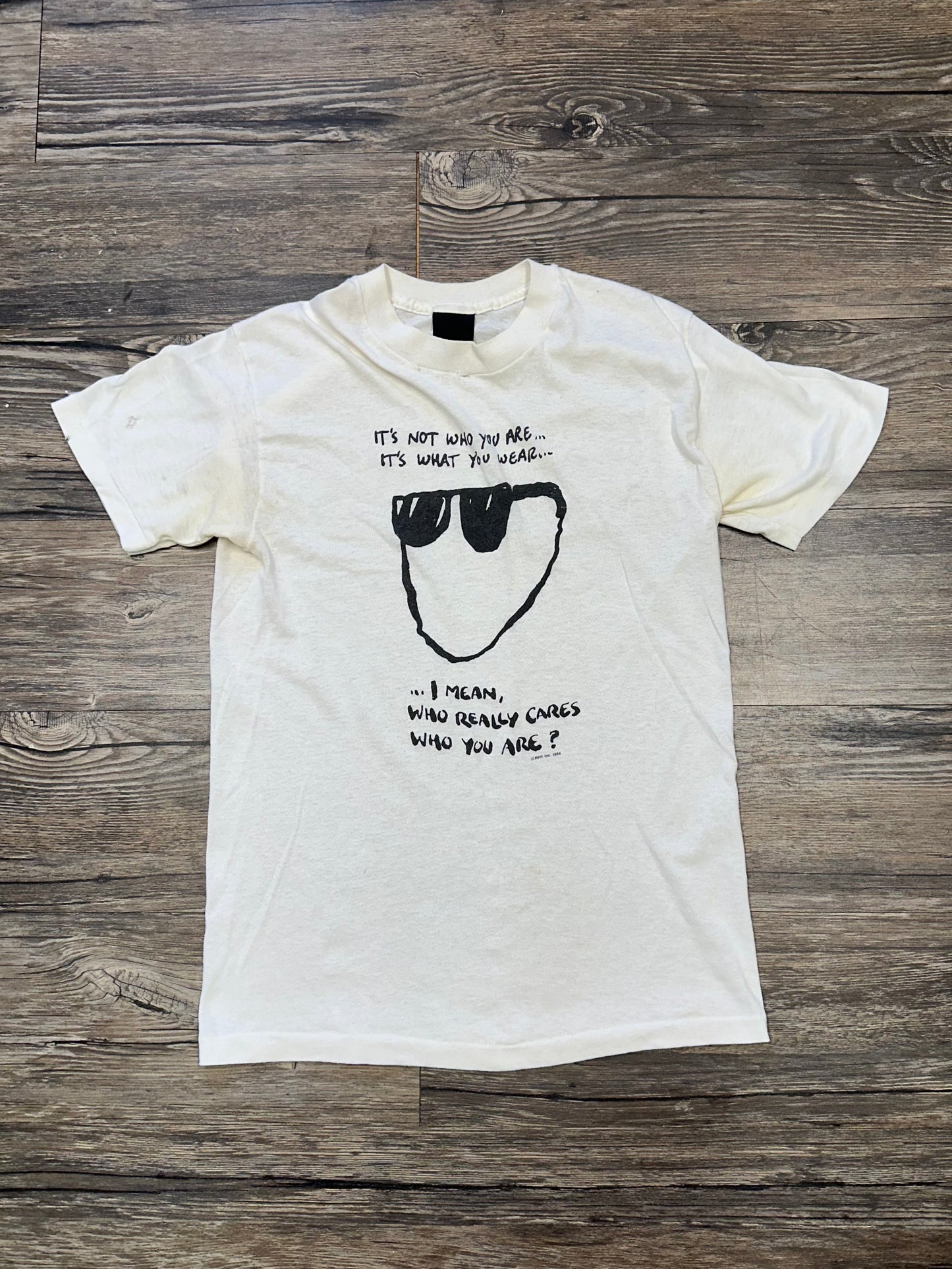 VINTAGE “WHO REALLY CARES?” GRAPHIC T-SHIRT (SMALL)
